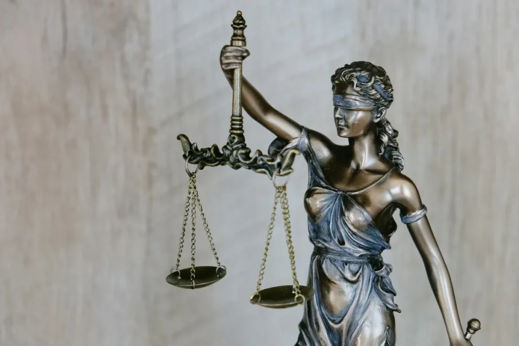 Statue of Lady Justice – continuing power of attorney or guardianship